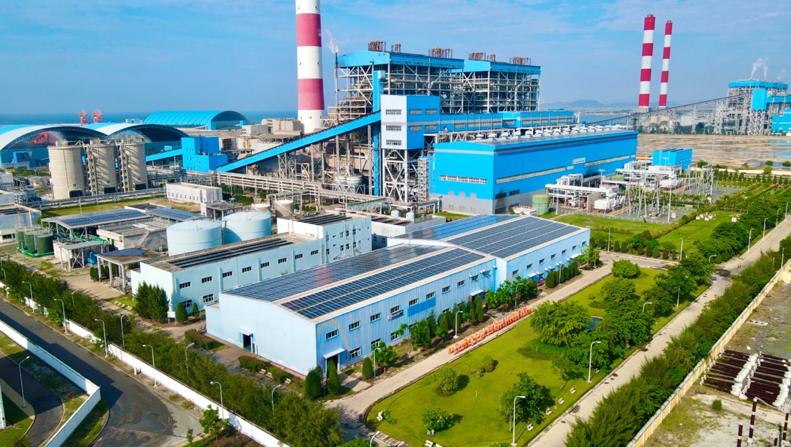 A factory with a large buildingDeion automatically generated with medium confidence